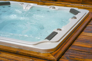A teakwood spa that is clean clear and has no odor in it